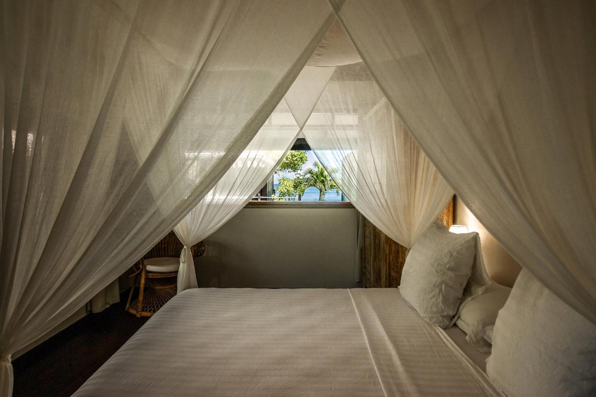 Le Coconut Lodge Avatoru Extérieur photo